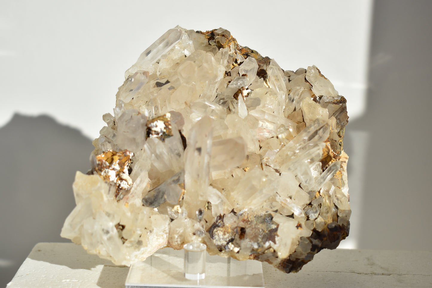 Clear quartz cluster with iron Oxide