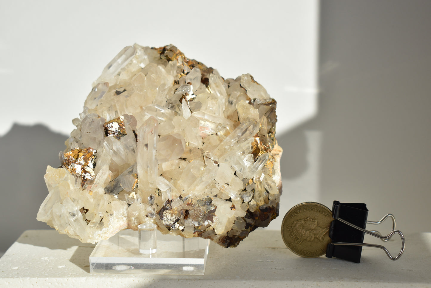 Clear quartz cluster with iron Oxide