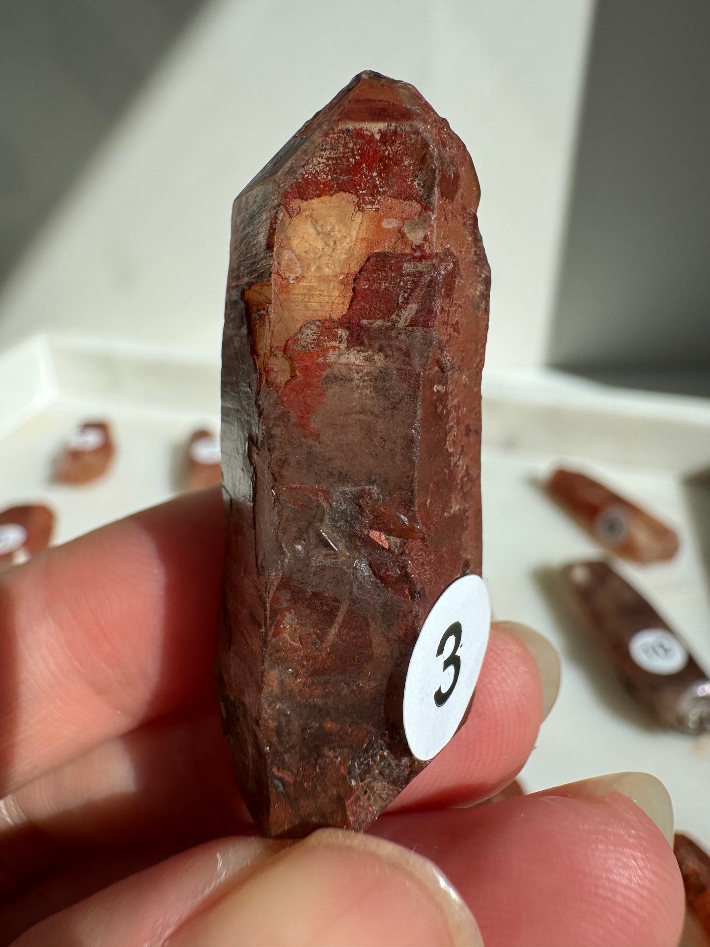 Tibetan Quartz Raw point ( Red Exterior)