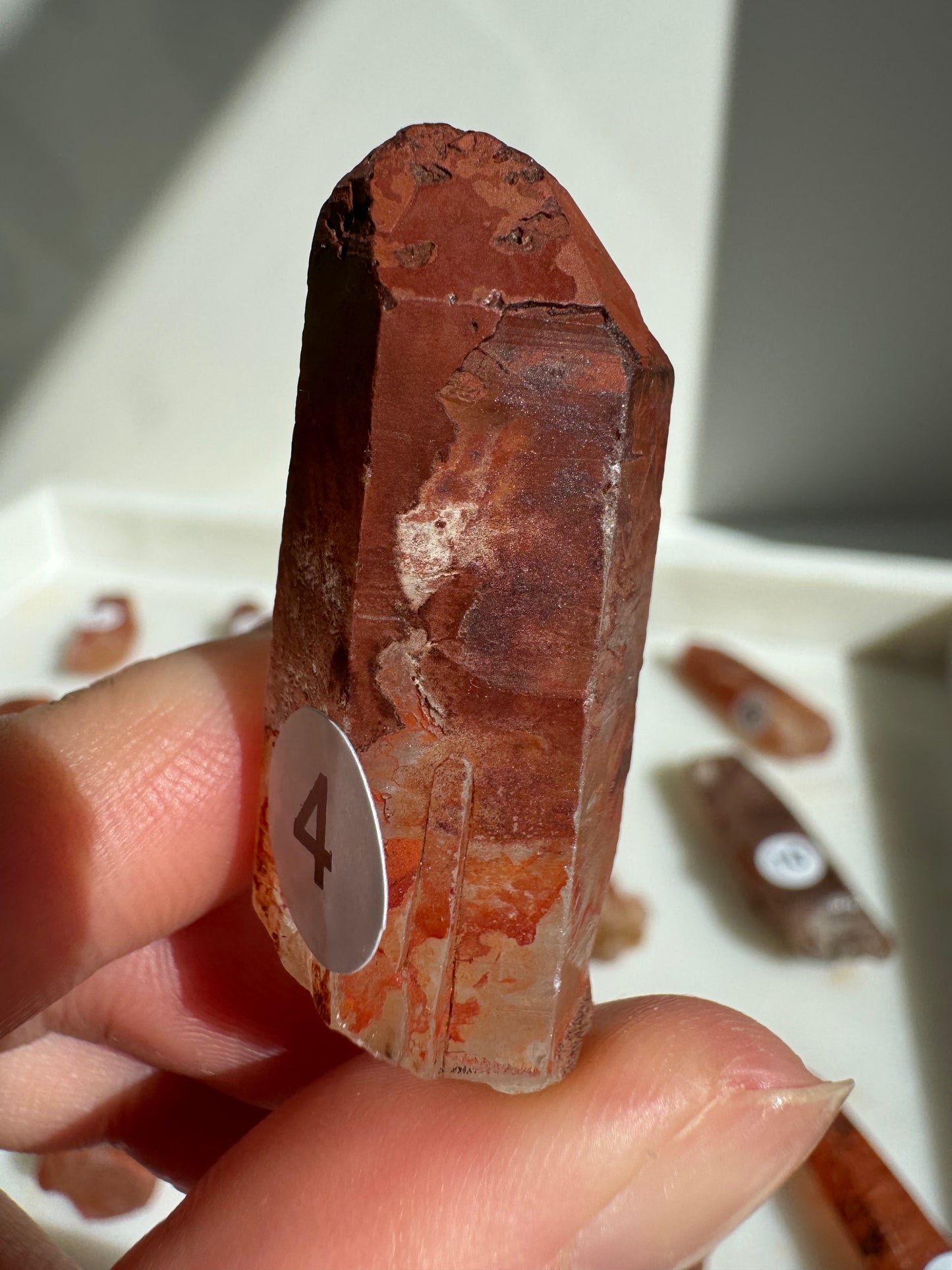Tibetan Quartz Raw point ( Red Exterior)