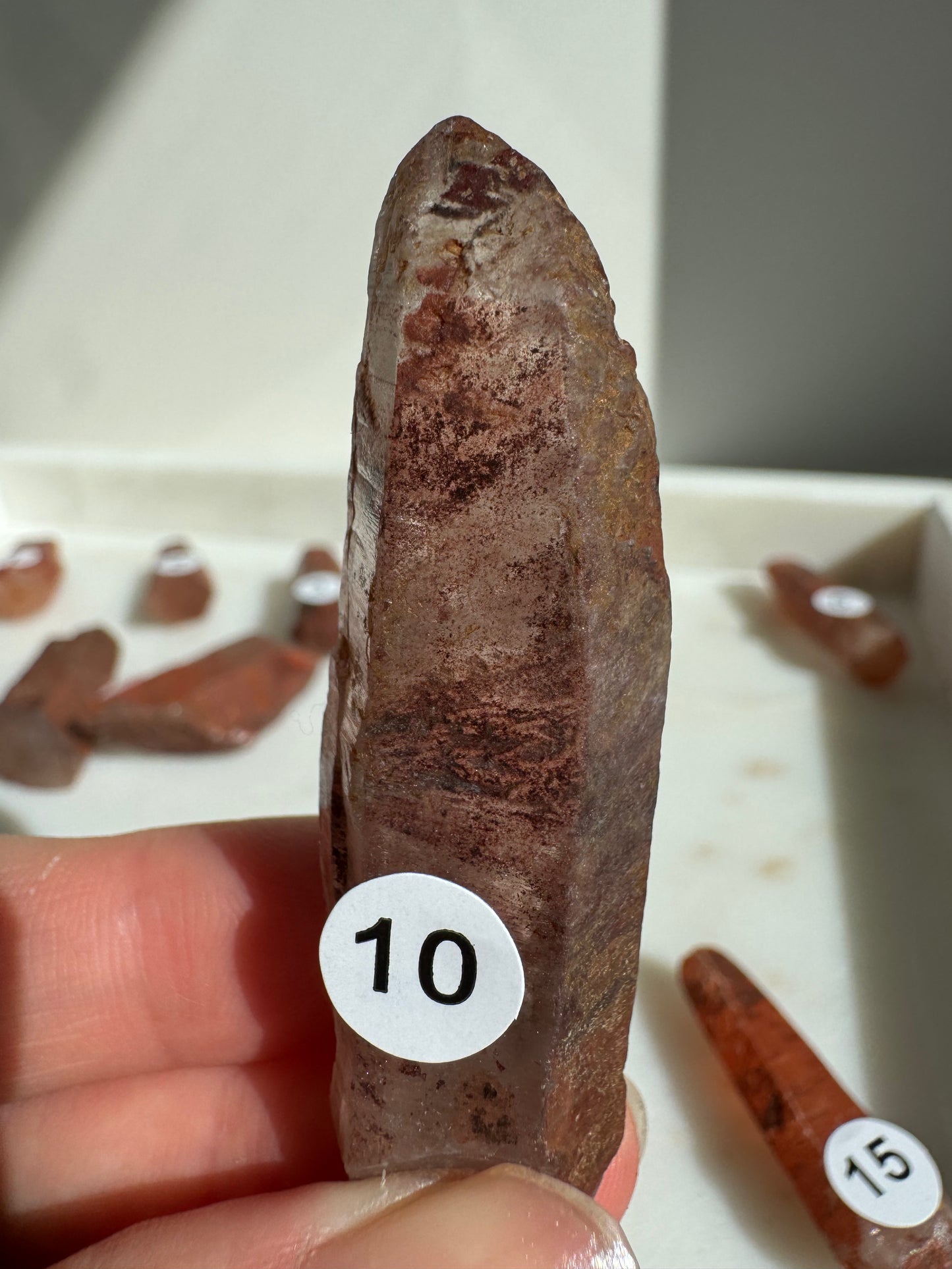 Tibetan Quartz Raw point ( Red Exterior)