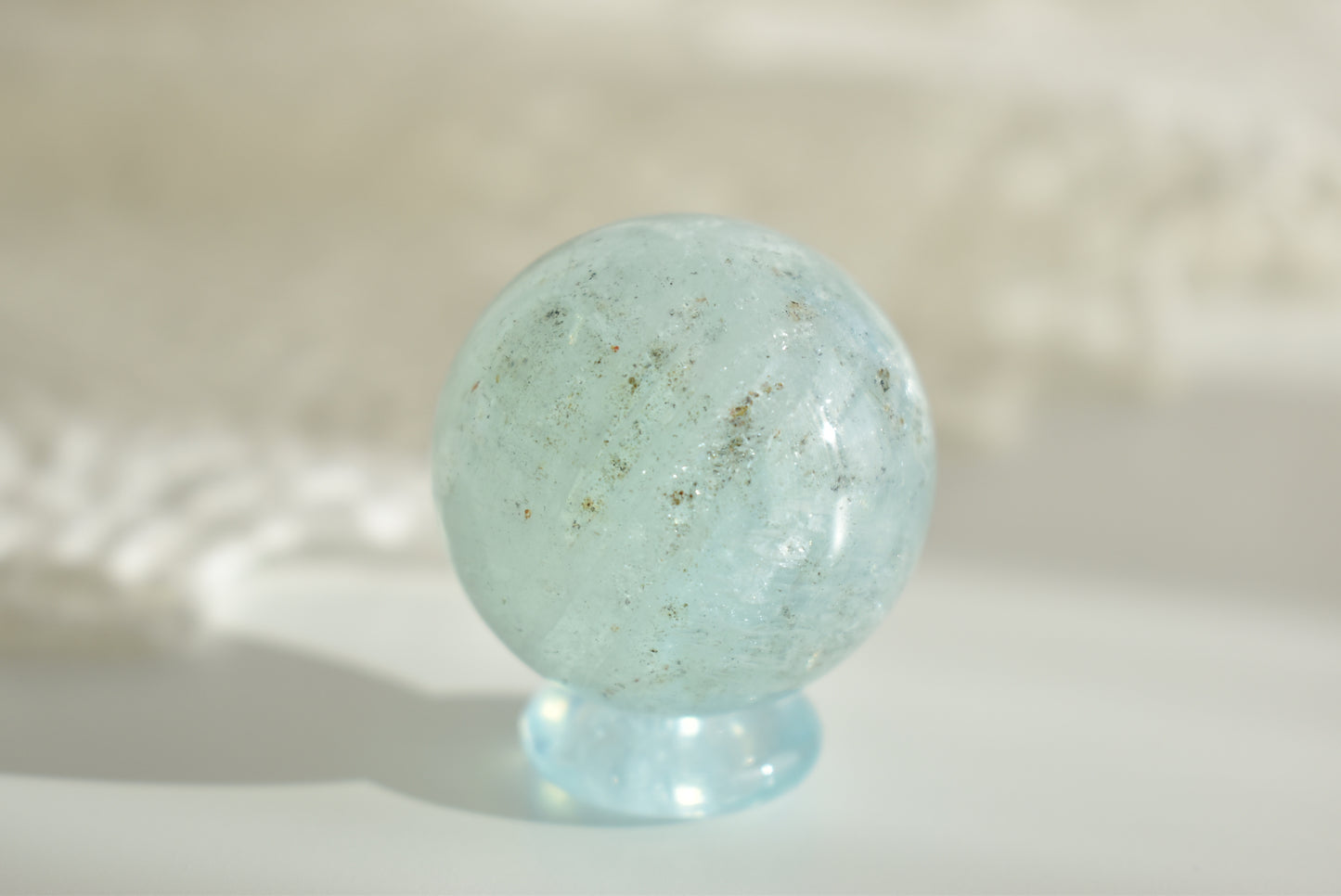 Aquamarine with Black Hematite Sphere  3.5cm