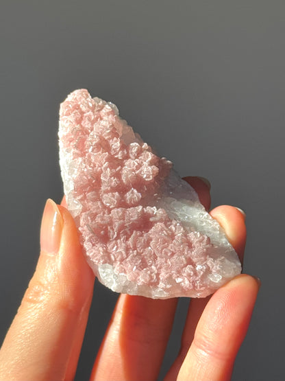 Rhodochrosite on Quartz (with pyrite) Specimen