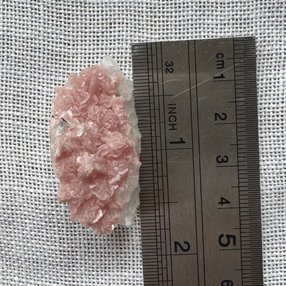 Rhodochrosite on Quartz (with pyrite) Specimen